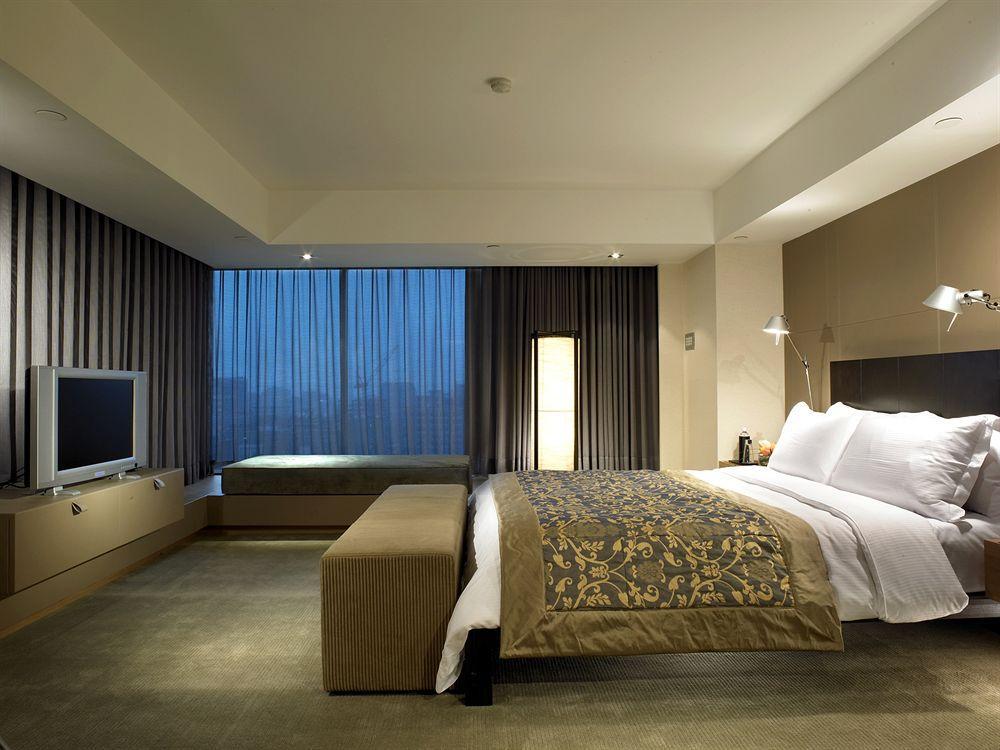 Regent Taipei Hotel Værelse billede A bedroom in a hotel